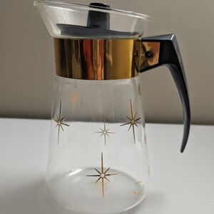 Pyrex Glass Pitcher with Gold Stars and Black Handle